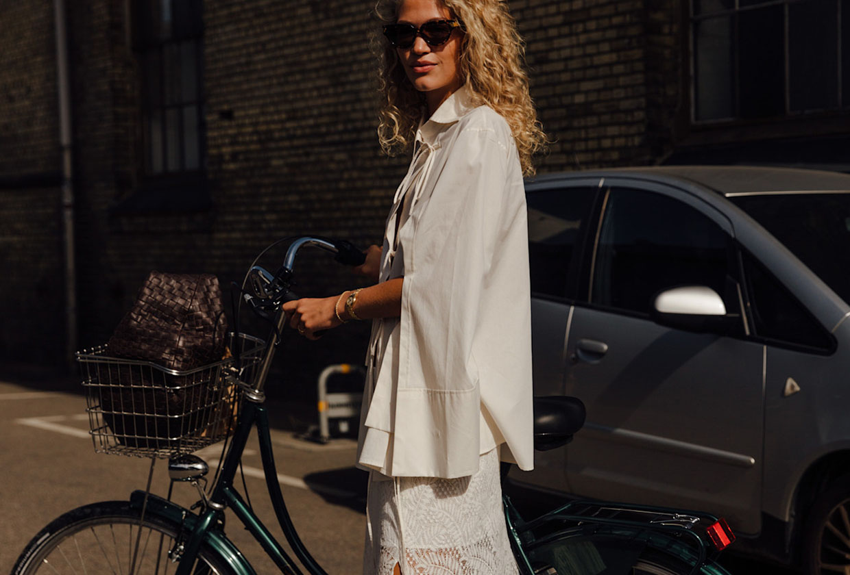 Woman in white blouse and lace skirt