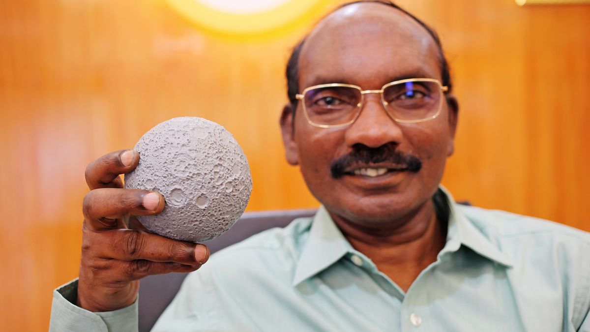 K. Sivan, head of the India Space Research Organisation, holds a lunar model on Aug. 26, 2019, as the country&#039;s Chandrayaan-2 spacecraft flew toward the moon.