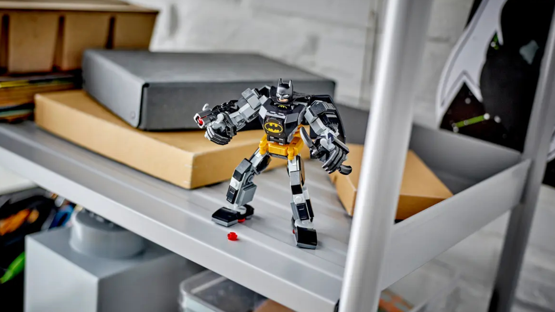Lego Batman Mech Armor set standing on an industrial-style shelf