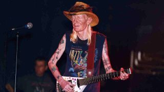 Johnny Winter performing onstage in the late 1990s