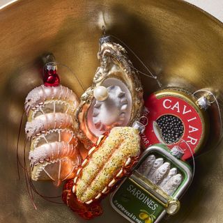 novelty Christmas tree ornaments, including oysters, sardines, caviar tin and lobster