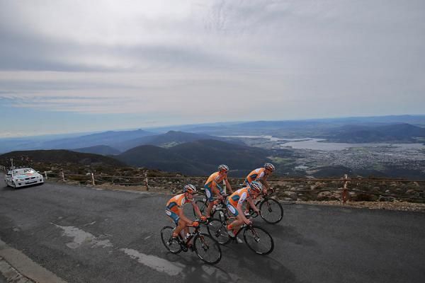 The Genesys Wealth Advisers team approach the finish line at the top of Mt Wellington