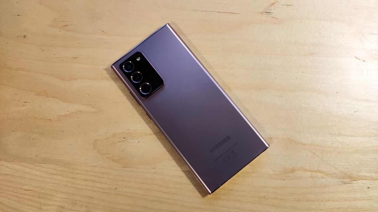 The Samsung Galaxy Note 20 Ultra 5G laid on its face on a surface with the rear showing
