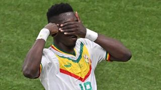 Ismaila Sarr celebrates after scoring for Senegal against Ecuador at the 2022 World Cup.