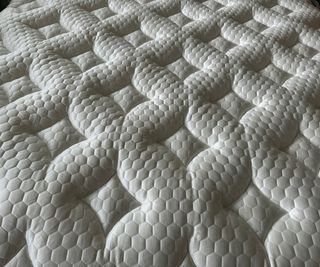 Close-up on the Helix Dusk Mattress.