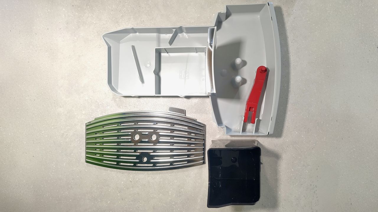 Drip tray for Philips Cafe Aromis Series 8000 coffee maker, removed from machine