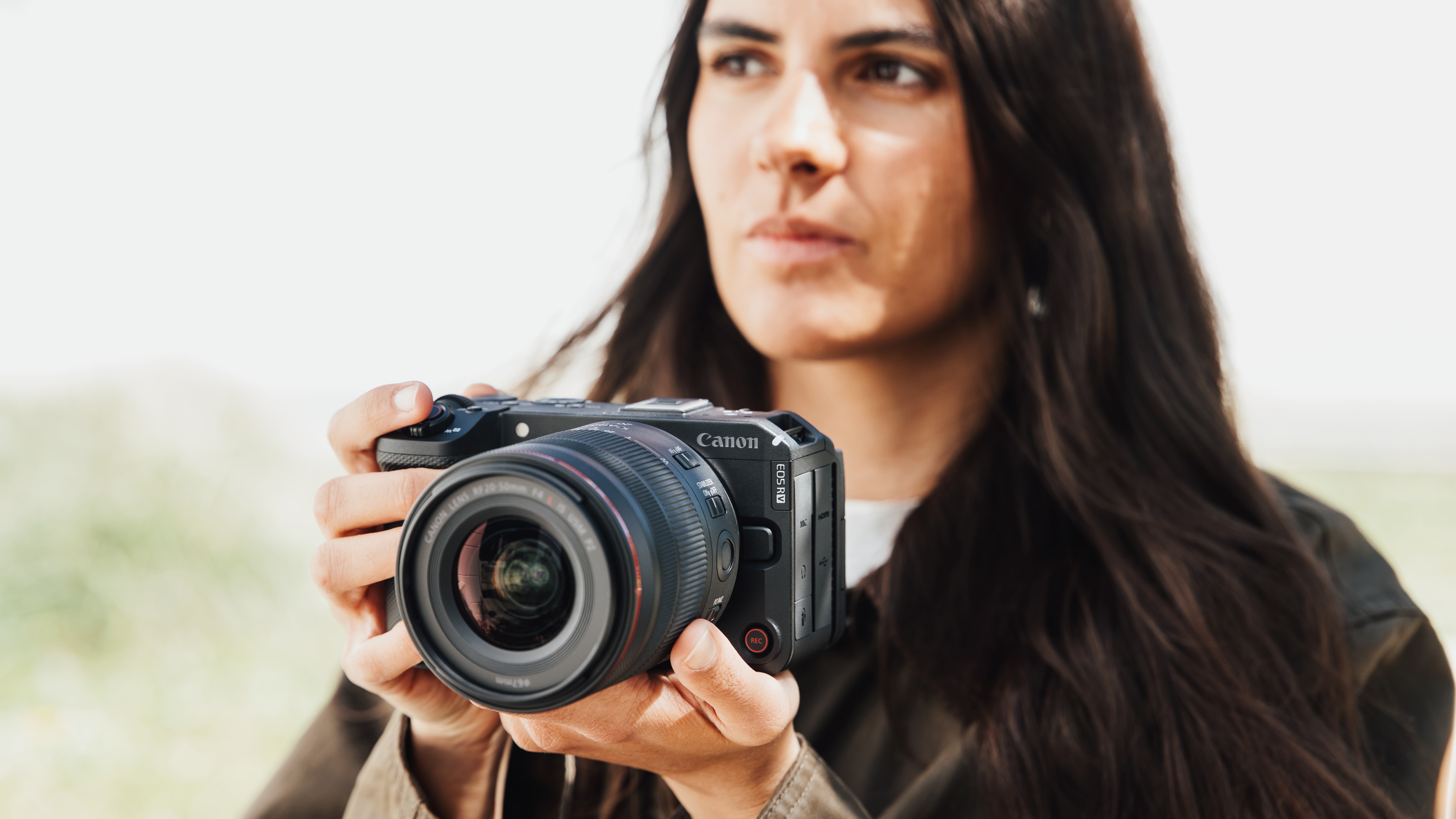 Canon EOS R6 V being used by a videographer outdoors