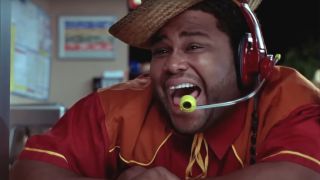 Anthony Anderson laughs maniacally in his Burger Shack uniform in Harold & Kumar Go to White Castle