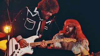 Randy Bachman and C F Turner of Bachman Turner Overdrive performing on stage, Hammersmith Odeon, London, 1975.