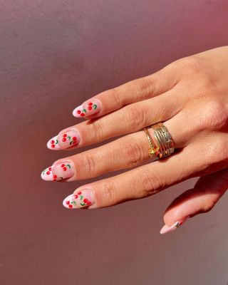 @nailartbyqueenie cherry French tip nails