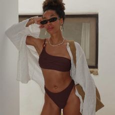 fashion influencer in a chic brown bikini 