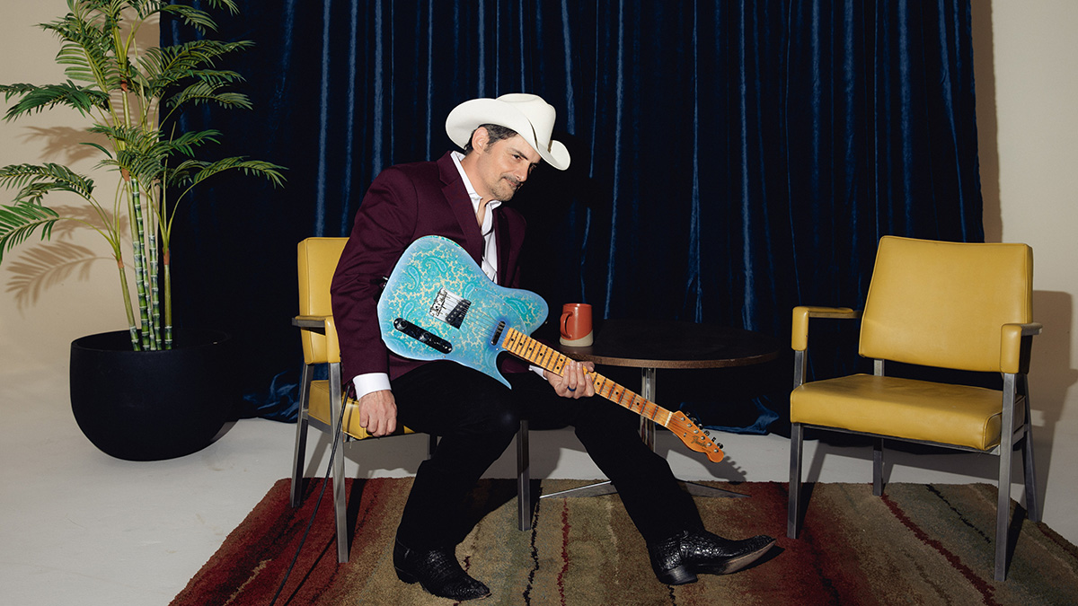 Brad Paisley holding his Limited Edition Brad Paisley 1967 “Lost Paisley” Telecaster