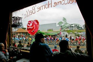 Locals watch the race pass by from inside a pub during the 2008 Tour of California.