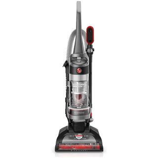 A grey, red and black upright vacuum