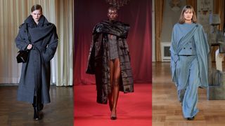 Three models at Copenhagen Fashion Week walk down a runway wearing draped statement coats