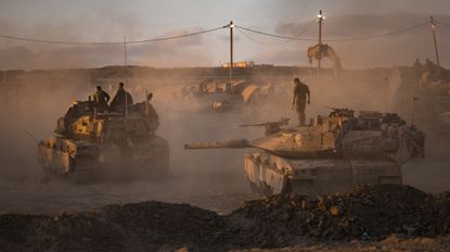 GAZA BORDER, ISRAEL - AUGUST 18: IDF soldiers prepare tanks on August 18, 2025 near the Gaza Strip's northern borders, Israel. On Monday it was reported that Hamas has agreed to the most recent ceasefire and hostage release proposal with Israel. Meanwhile, Israel has continued carrying out strikes in Gaza as part of Prime Minister Benjamin Netanyahu's plan to expand the IDF offensive to fully occupy the enclave. The move has been met with widespread condemnation by the international community, as well as hostage families, who say the operation will further endanger the 20 or hostages still believed to be held alive by Hamas in Gaza, as well as one million Palestinians in Gaza City, who are already facing displacement and an acute hunger crisis.