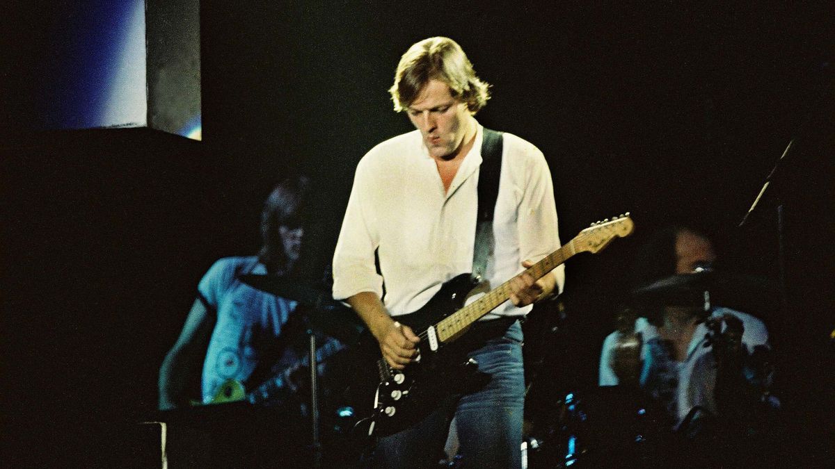 Gilmour on stage in 1980 performing The Wall