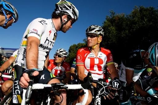 Mark Cavendish (HTC - Highroad) and Lance Armstrong (RadioShack) chat on the start line.