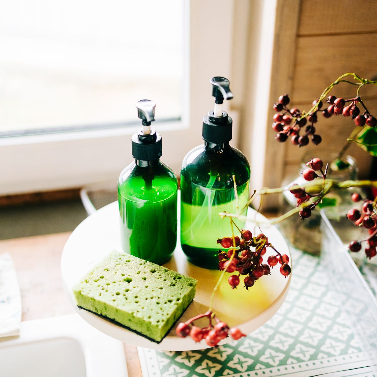 soap dispensers next to sink 