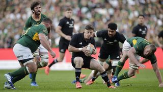 New Zealand's fly-half Ruben Love runs with the ball during the Rugby's Greatest Rivalry international rugby union match between South Africa and New Zealand at Ellis Park Stadium in Johannesburg