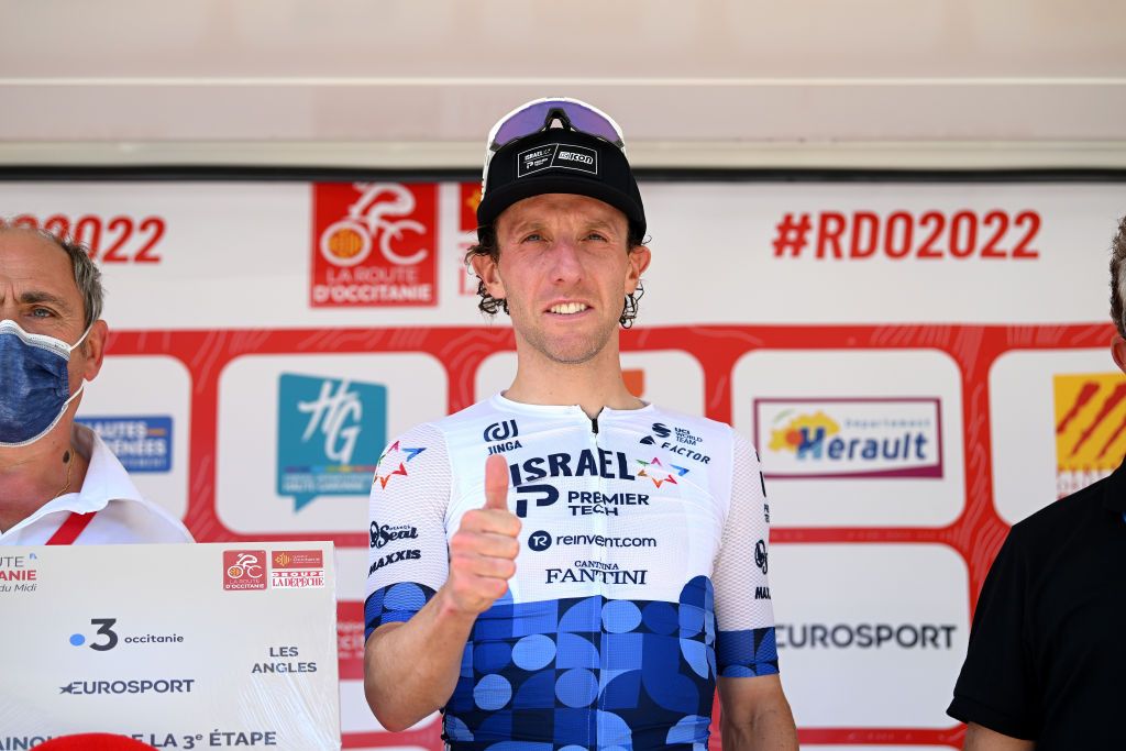LES ANGLES FRANCE JUNE 18 Michael Woods of Canada and Team Israel Premier Tech celebrates winning the stage on the podium ceremony after the 46th La Route dOccitanie La Depeche du Midi 2022 Stage 3 a 1887km stage from Sigean to Les Angles 1841m RDO2022 on June 18 2022 in Les Angles France Photo by Dario BelingheriGetty Images