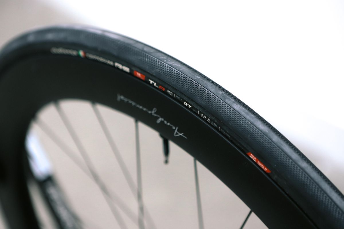 a close up of a black road bike tyre