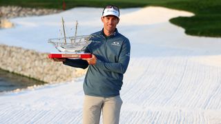 Dylan Frittelli with the trophy after his Bahrain Championship victory