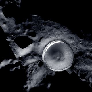 a large crater on the moon's grey surface
