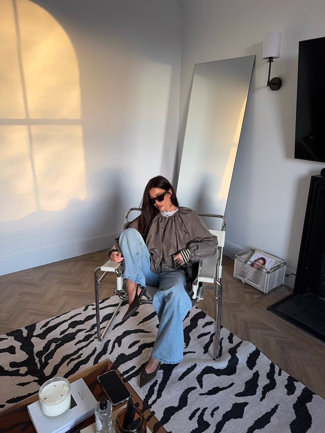 woman wearing heels with jeans spring outfit 2026