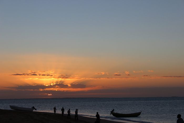 Fishermen at sunset in Mozambique, sustainable fishing