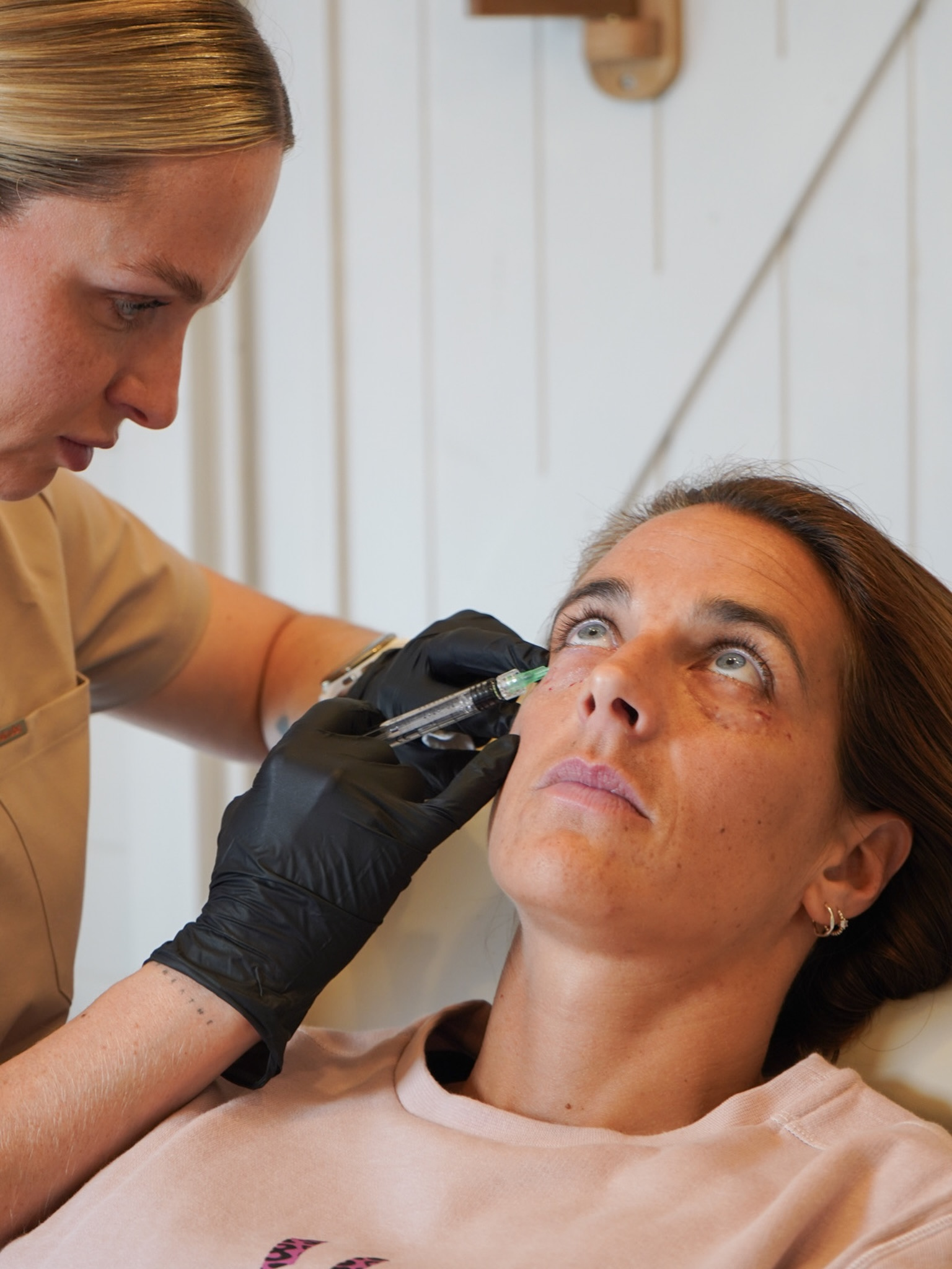 A client having an under-eye injectable treatment