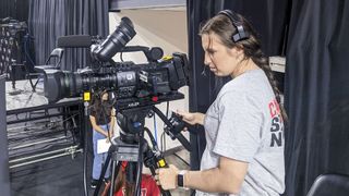 A camera operator uses Reidel Communications beltpacks at Lamar University.