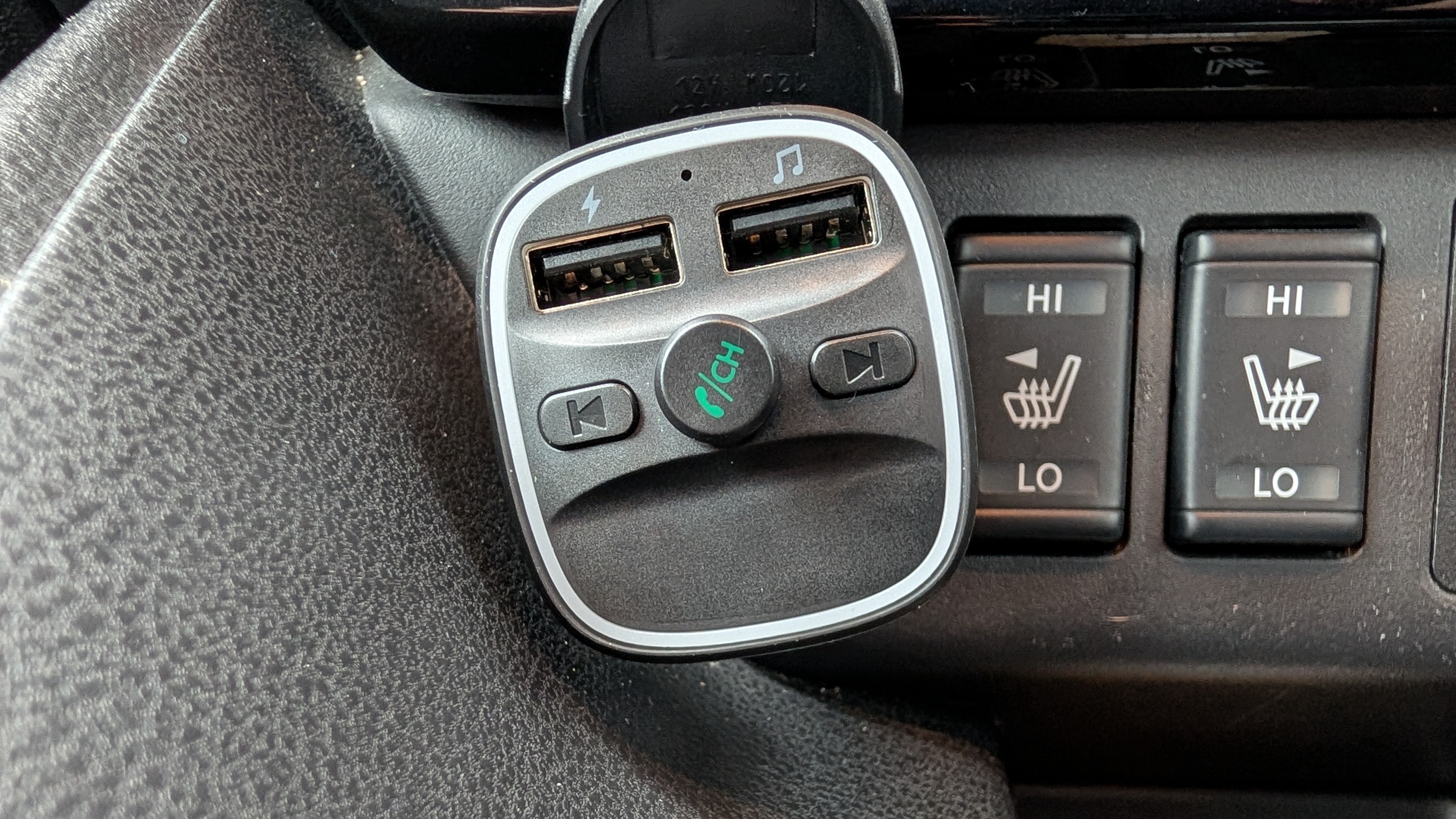 lencent fm transmitter inside a nissan leaf cockpit
