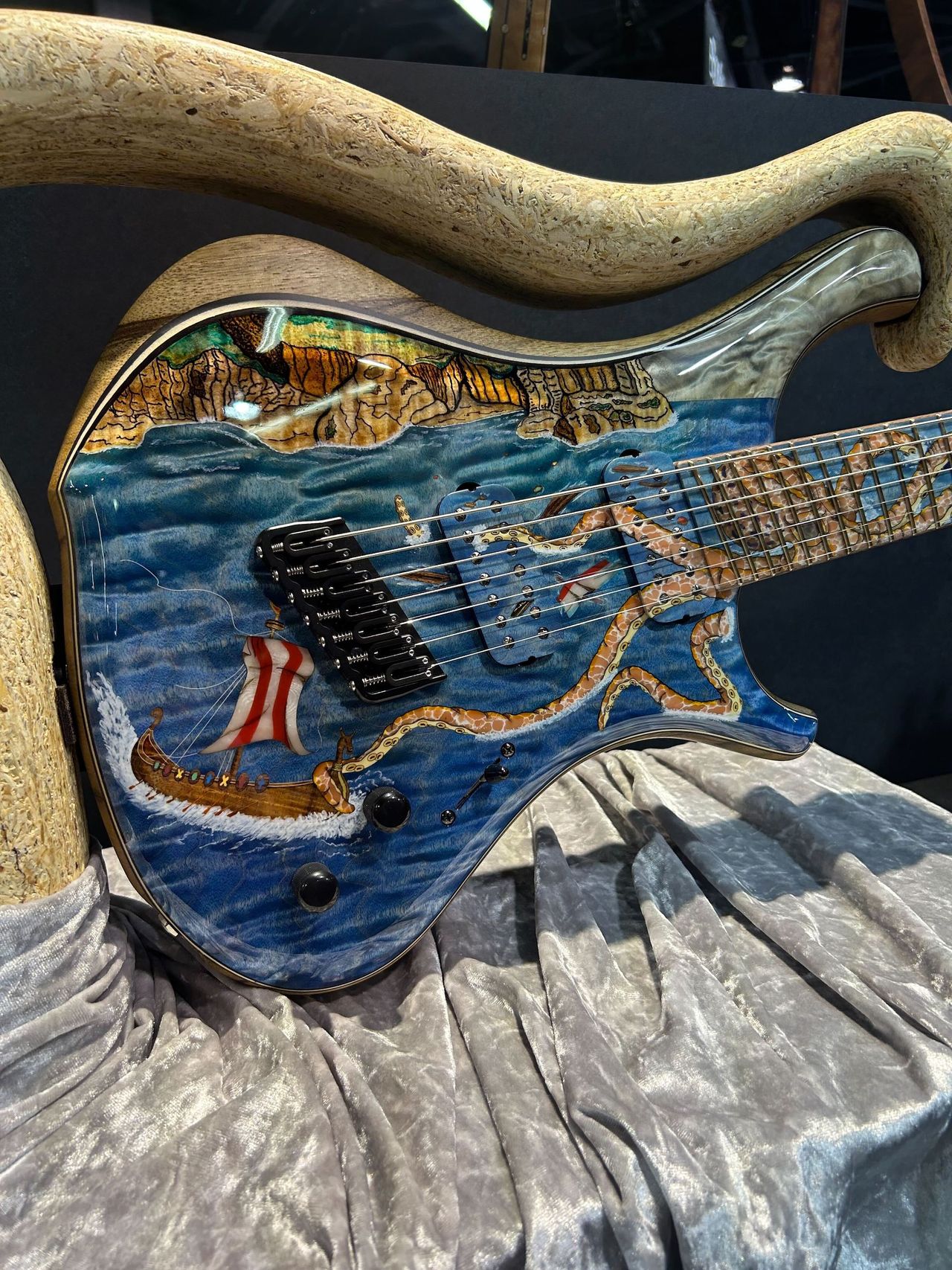 Four of the guitars displayed at the Boutique Guitar Showcase at the 2025 NAMM Show in Anaheim, California
