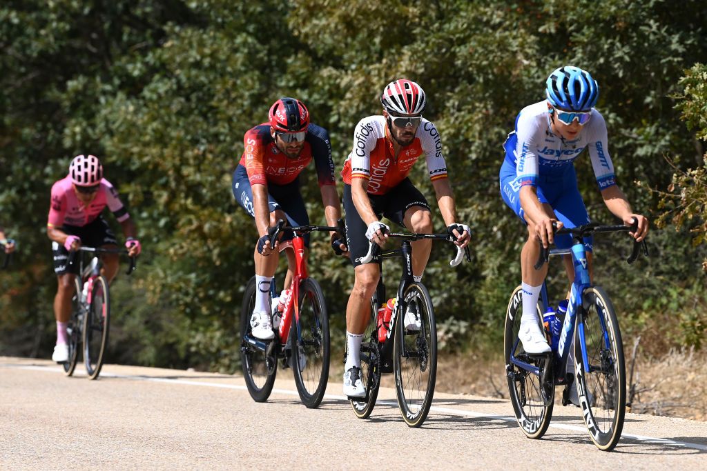 LA LAGUNA NEGRAVINUESA SPAIN SEPTEMBER 06 LR Filippo Ganna of Italy and Team INEOS Grenadiers and Jess Herrada of Spain and Team Cofidis compete in the breakaway during the 78th Tour of Spain 2023 Stage 11 a 1632km stage from Lerma to La Laguna Negra Vinuesa 1730m UCIWT on September 06 2023 in La Laguna NegraVinuesa Spain Photo by Tim de WaeleGetty Images