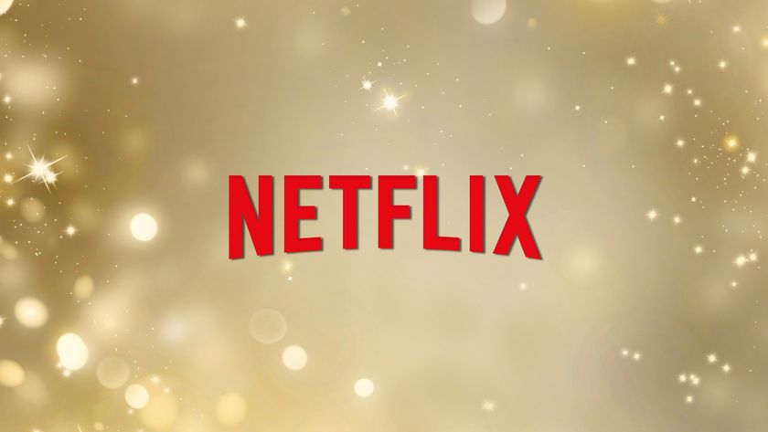 Netflix logo on a gold sparks background