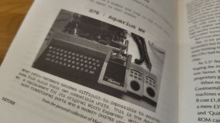 retro computers; a photo of a vintage computer in a book