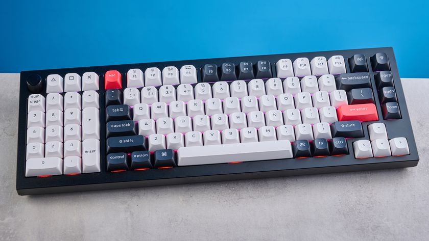 A black, white and red Keychron Q12 HE gaming keyboard with Hall Effect switches