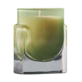 A green glass candle