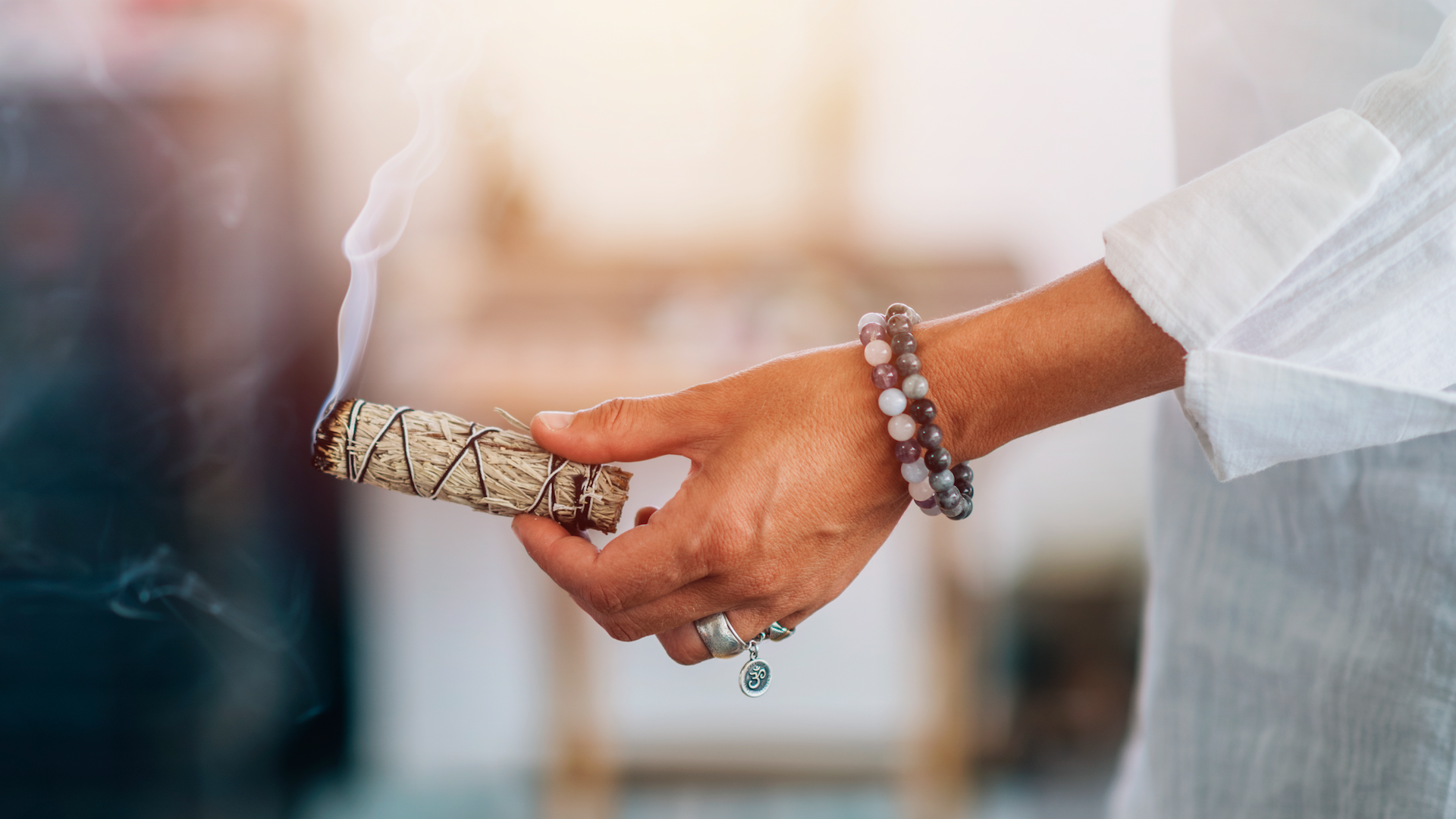 Woman burning sage