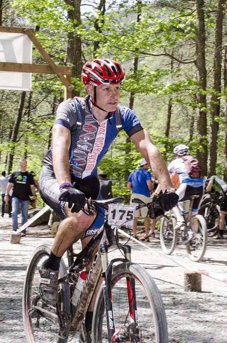 A Team Rare Diseases rider finishes up