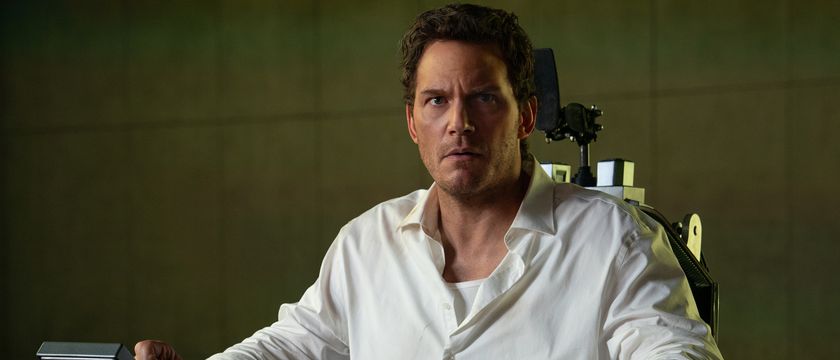 Chris Pratt as Chris Raven sitting in a chair in Mercy 