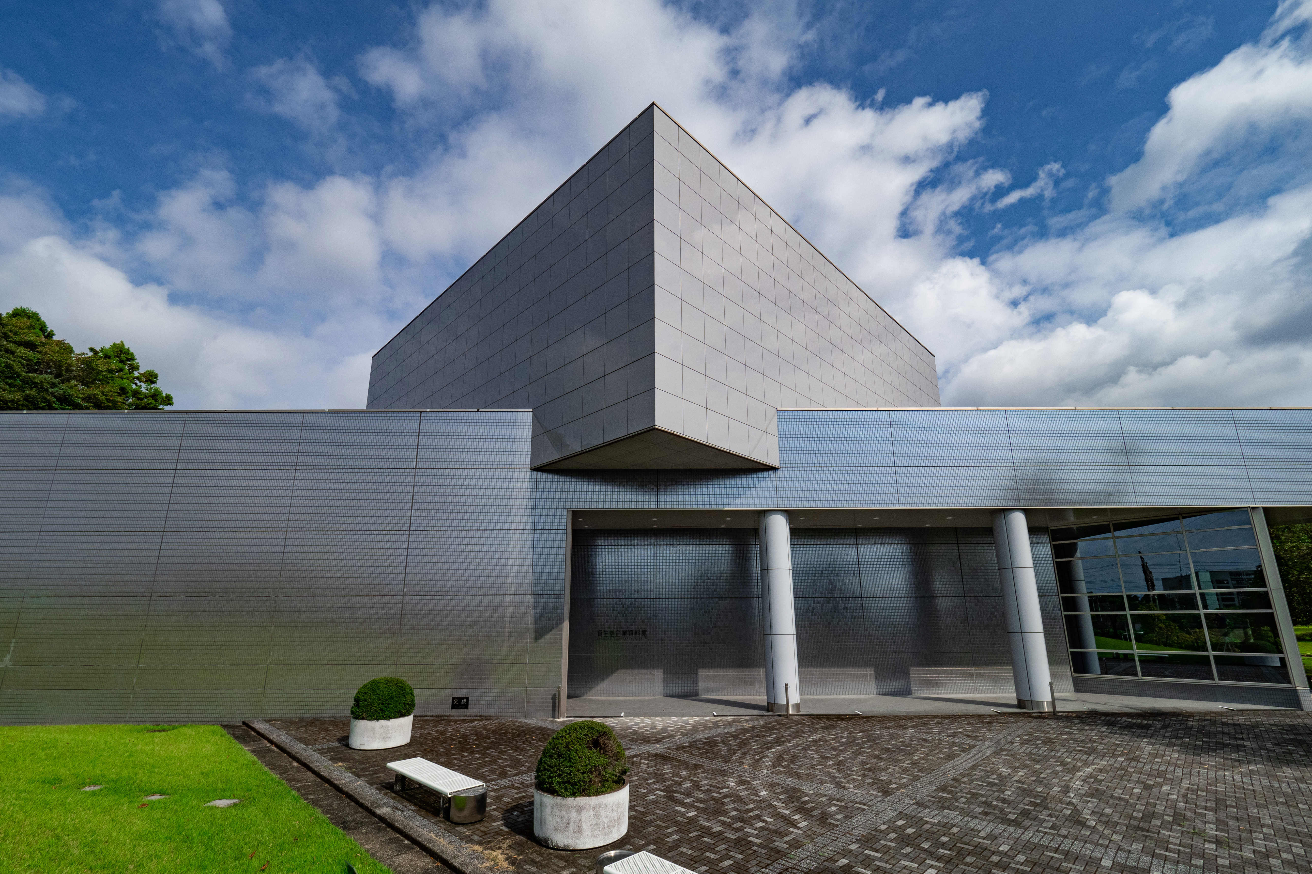 Exterior of grey angular building, Shiseido Corporate Museum