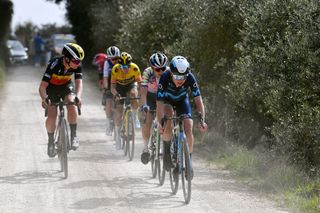 SIENA ITALY MARCH 05 LR Lotte Kopecky of Belgium and Team SD Worx and Annemiek Van Vleuten of Netherlands and Movistar Team compete in the breakaway through gravel roads during the Eroica 8th Strade Bianche 2022 Womens Elite a 136km one day race from Siena to Siena Piazza del Campo 321m StradeBianche on March 05 2022 in Siena Italy Photo by Luc ClaessenGetty Images