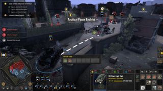 A tank rolls into a city, aiming at the enemy.