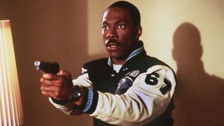 Eddie Murphy holding gun in Beverly Hills Cop III