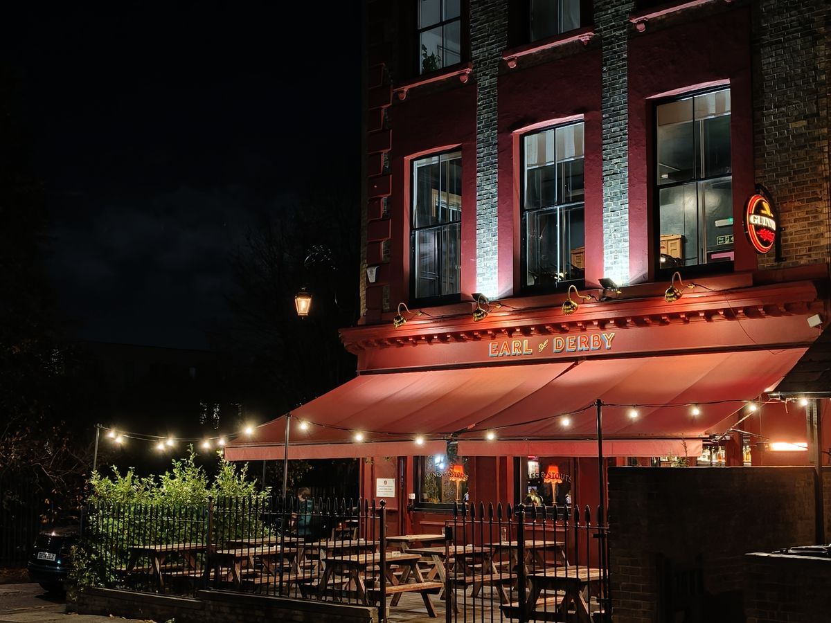 A pub lit up at night