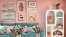 Pink living room with wall art
