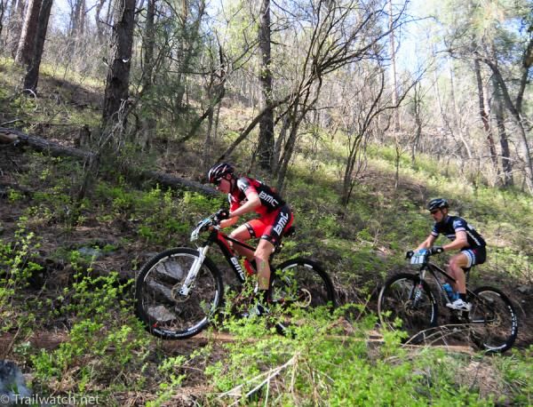 Tyler Coplea (BMC Development) riding uphill switchbacks