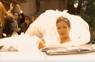 A still from the November Rain video showing the bride leaving the wedding
